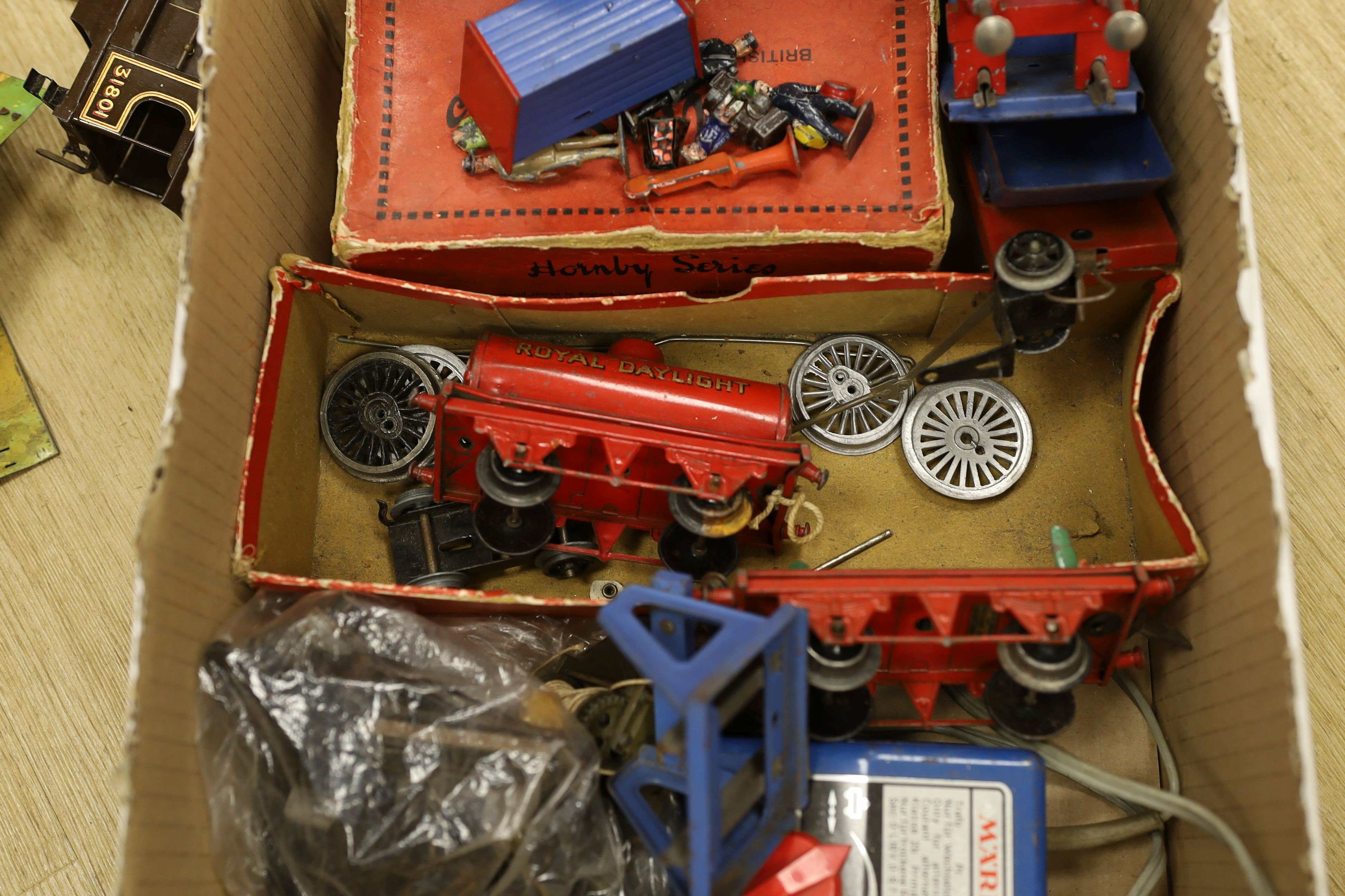 A mixed quantity of Hornby model railway track, a metal crossing, an engine and other items